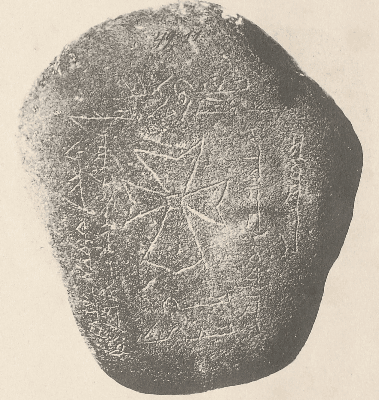 black and white photo of engraved stone